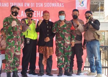 Kirab Bendera Merah Putih Sepanjang 250 Meter Disaksikan Danramil Krian, Sidoarjo Kapten Inf Sanusi