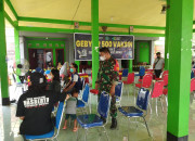 Babinsa Pelda Nimrot Gultom Hadiri Gebyar 500 Vaksin Desa Katerungan Kecamatan Krian