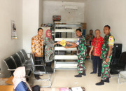 Wujud Sinergi, Dinas Perpustakaan Sidoarjo Serahkan Bantuan Buku Untuk Desa Penambangan Melalui Satgas Tmmd Ke-120