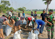 Satgas Tmmd Ke-120 Kodim 0816 Laksanakan Normalisasi Sungai Di Desa Penambangan