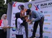 Personel Polres Lamongan Raih Dua Medali Kejurnas Uny Open Run And Jump Competition
